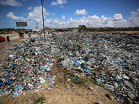 Piles of garbage are accumulating in Khan Yunis, in the southern Gaza Strip, amid the ongoing conflict between Israel and Hamas, on May 6, 2...