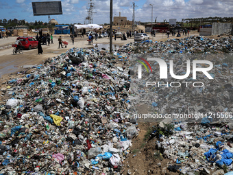 Piles of garbage are accumulating in Khan Yunis, in the southern Gaza Strip, amid the ongoing conflict between Israel and Hamas, on May 6, 2...