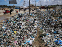 Piles of garbage are accumulating in Khan Yunis, in the southern Gaza Strip, amid the ongoing conflict between Israel and Hamas, on May 6, 2...