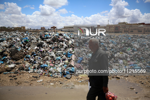 Piles of garbage are accumulating in Khan Yunis, in the southern Gaza Strip, amid the ongoing conflict between Israel and Hamas, on May 6, 2...