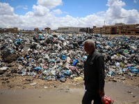 Piles of garbage are accumulating in Khan Yunis, in the southern Gaza Strip, amid the ongoing conflict between Israel and Hamas, on May 6, 2...