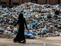 Piles of garbage are accumulating in Khan Yunis, in the southern Gaza Strip, amid the ongoing conflict between Israel and Hamas, on May 6, 2...