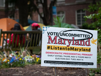 A sign at the Gaza solidarity encampment at George Washington University urges people to vote against Joe Biden in Maryland's presidential p...