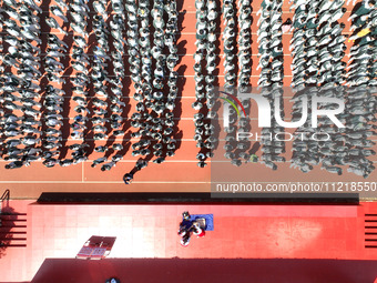 Volunteers from the Red Cross are explaining first aid at Xiyuan Middle School in Lianyungang, Jiangsu Province, East China, on May 8, 2024....