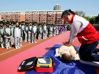 Volunteers from the Red Cross are explaining first aid at Xiyuan Middle School in Lianyungang, Jiangsu Province, East China, on May 8, 2024....