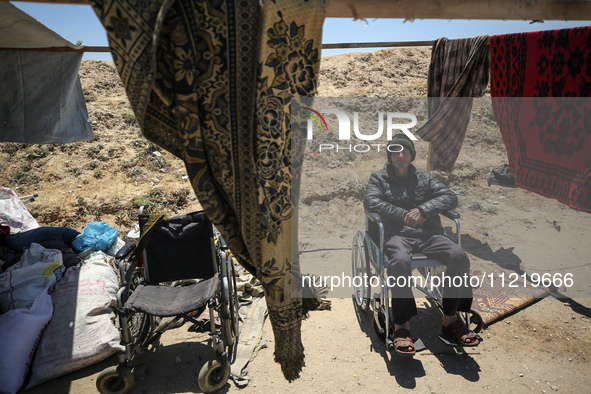 Displaced Palestinians are setting up tents on a beach near Deir el-Balah in the central Gaza Strip amid the ongoing conflict between Israel...