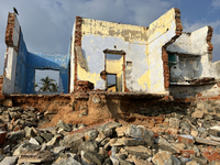 Houses are being destroyed by the ocean tides along Kollamkode Beach in Kollamkode, Kerala, India, on April 15, 2024. (