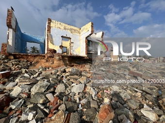 Houses are being destroyed by the ocean tides along Kollamkode Beach in Kollamkode, Kerala, India, on April 15, 2024. (