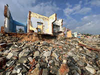 Houses are being destroyed by the ocean tides along Kollamkode Beach in Kollamkode, Kerala, India, on April 15, 2024. (