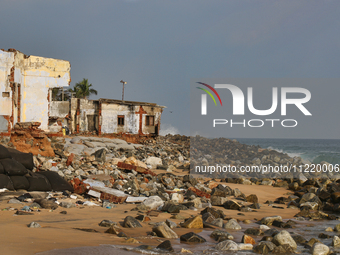 Houses are being destroyed by the ocean tides along Kollamkode Beach in Kollamkode, Kerala, India, on April 15, 2024. (