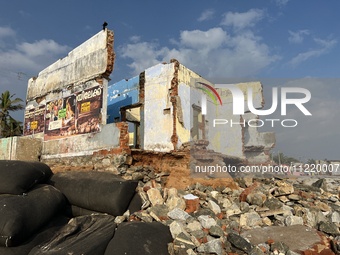 Houses are being destroyed by the ocean tides along Kollamkode Beach in Kollamkode, Kerala, India, on April 15, 2024. (