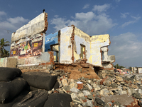 Houses are being destroyed by the ocean tides along Kollamkode Beach in Kollamkode, Kerala, India, on April 15, 2024. (