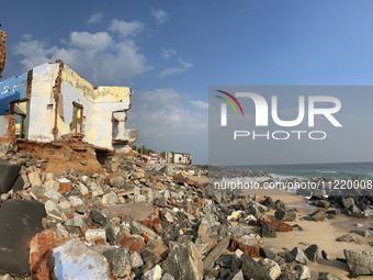 Houses are being destroyed by the ocean tides along Kollamkode Beach in Kollamkode, Kerala, India, on April 15, 2024. (