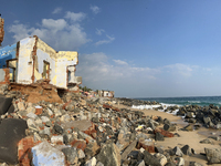 Houses are being destroyed by the ocean tides along Kollamkode Beach in Kollamkode, Kerala, India, on April 15, 2024. (