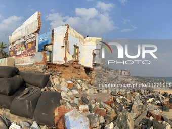 Houses are being destroyed by the ocean tides along Kollamkode Beach in Kollamkode, Kerala, India, on April 15, 2024. (