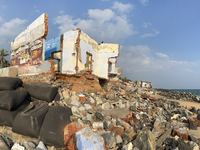 Houses are being destroyed by the ocean tides along Kollamkode Beach in Kollamkode, Kerala, India, on April 15, 2024. (