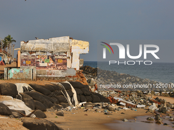 Houses are being destroyed by the ocean tides along Kollamkode Beach in Kollamkode, Kerala, India, on April 15, 2024. (