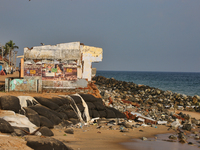 Houses are being destroyed by the ocean tides along Kollamkode Beach in Kollamkode, Kerala, India, on April 15, 2024. (