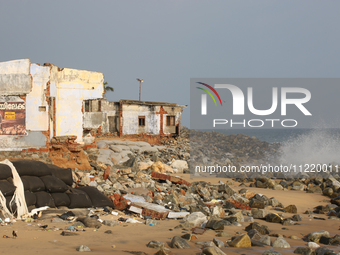 Houses are being destroyed by the ocean tides along Kollamkode Beach in Kollamkode, Kerala, India, on April 15, 2024. (