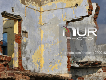 Houses are being destroyed by the ocean tides along Kollamkode Beach in Kollamkode, Kerala, India, on April 15, 2024. (