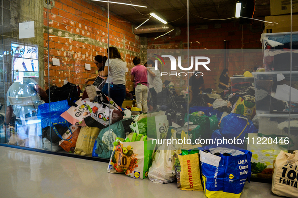 In Lisbon, individuals are gathering hygiene materials, water, clothes, and other items to send on flights to Brazil to address the emergenc...