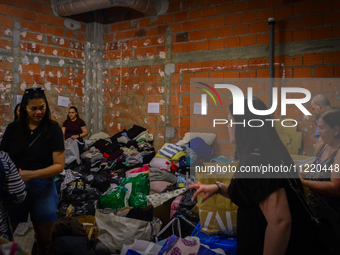 In Lisbon, individuals are gathering hygiene materials, water, clothes, and other items to send on flights to Brazil to address the emergenc...