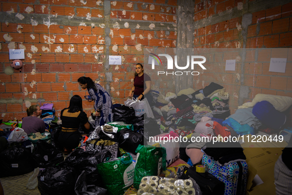 In Lisbon, individuals are gathering hygiene materials, water, clothes, and other items to send on flights to Brazil to address the emergenc...