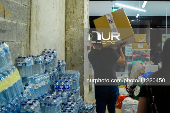 In Lisbon, individuals are gathering hygiene materials, water, clothes, and other items to send on flights to Brazil to address the emergenc...