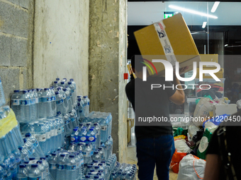 In Lisbon, individuals are gathering hygiene materials, water, clothes, and other items to send on flights to Brazil to address the emergenc...