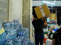 In Lisbon, individuals are gathering hygiene materials, water, clothes, and other items to send on flights to Brazil to address the emergenc...