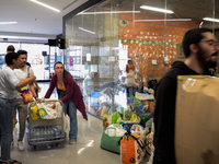 In Lisbon, individuals are gathering hygiene materials, water, clothes, and other items to send on flights to Brazil to address the emergenc...