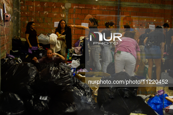 In Lisbon, individuals are gathering hygiene materials, water, clothes, and other items to send on flights to Brazil to address the emergenc...