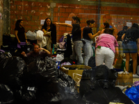 In Lisbon, individuals are gathering hygiene materials, water, clothes, and other items to send on flights to Brazil to address the emergenc...