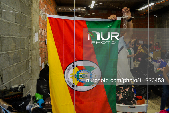 In Lisbon, individuals are gathering hygiene materials, water, clothes, and other items to send on flights to Brazil to address the emergenc...