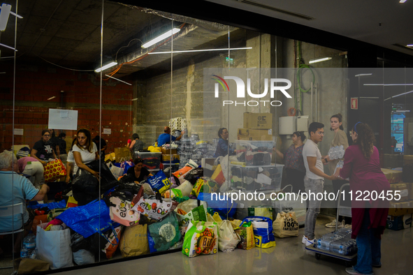 In Lisbon, individuals are gathering hygiene materials, water, clothes, and other items to send on flights to Brazil to address the emergenc...