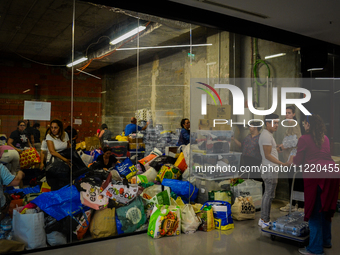 In Lisbon, individuals are gathering hygiene materials, water, clothes, and other items to send on flights to Brazil to address the emergenc...