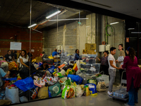 In Lisbon, individuals are gathering hygiene materials, water, clothes, and other items to send on flights to Brazil to address the emergenc...