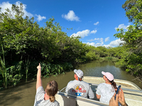 People take part in a boat tour in Everglades National Park, United States on May 6, 2024. (