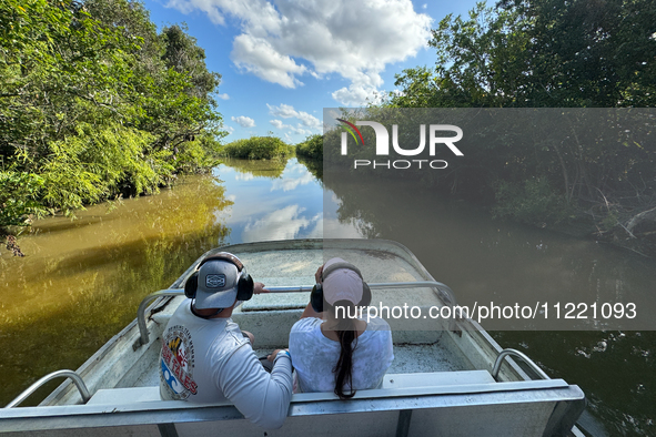 People take part in a boat tour in Everglades National Park, United States on May 6, 2024. 