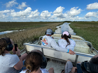 People take part in a boat tour in Everglades National Park, United States on May 6, 2024. (