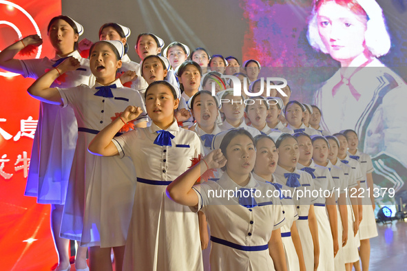 Students are taking an oath during a hat conferring ceremony at a nursing school in Yantai, Shandong Province, China, on May 8, 2024. 