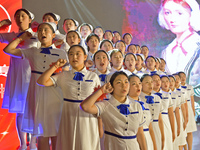 Students are taking an oath during a hat conferring ceremony at a nursing school in Yantai, Shandong Province, China, on May 8, 2024. (