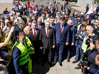 Sergey Andreyev, Russian Ambassador to Poland (C) lays flowers at the Mausoleum of the Soviet Soldiers Cemetery on Russian Victory Day, May...