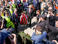 Sergey Andreyev, Russian Ambassador to Poland (C) lays flowers at the Mausoleum of the Soviet Soldiers Cemetery on Russian Victory Day, May...