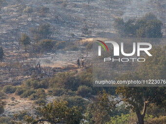 Volunteers are on site in Limassol, Cyprus, on May 9, 2024, as a wildfire is breaking out at the Industrial Zone of Ipsonas, a few kilometer...