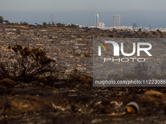 Skyscrapers are being viewed from the site in Limassol, Cyprus, on May 9, 2024. A wildfire is burning at the Industrial Zone of Ipsonas, a f...