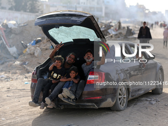 Displaced Palestinians are returning to Khan Yunis in the southern Gaza Strip to set up shelter amid the ongoing conflict between Israel and...