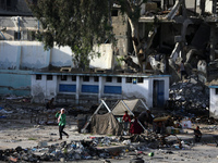 Displaced Palestinians are returning to Khan Yunis in the southern Gaza Strip to set up shelter amid the ongoing conflict between Israel and...