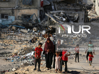 Displaced Palestinians are returning to Khan Yunis in the southern Gaza Strip to set up shelter amid the ongoing conflict between Israel and...