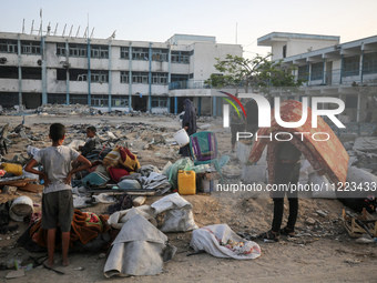 Displaced Palestinians are returning to Khan Yunis in the southern Gaza Strip to set up shelter amid the ongoing conflict between Israel and...